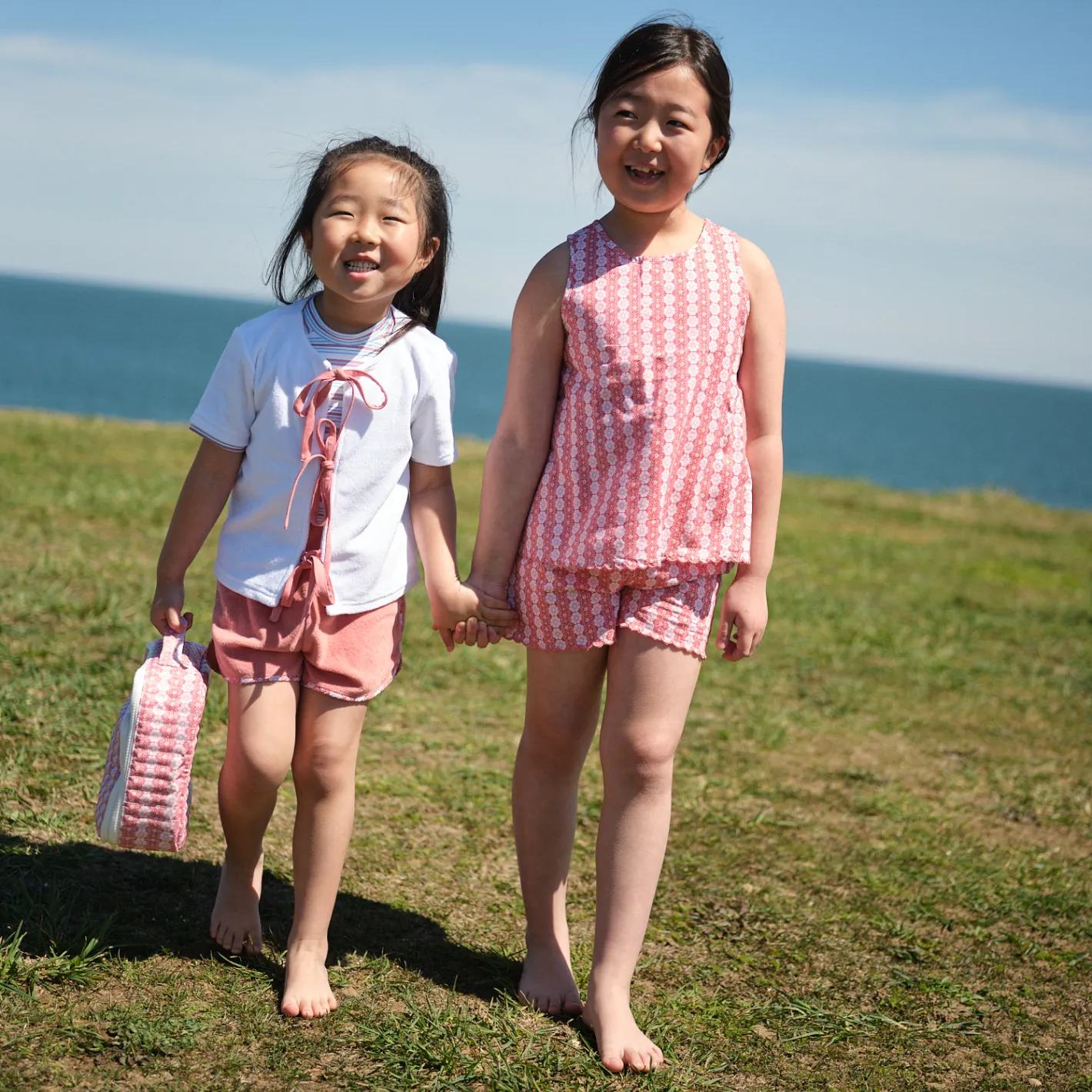 girls white and east end red french terry coverup top